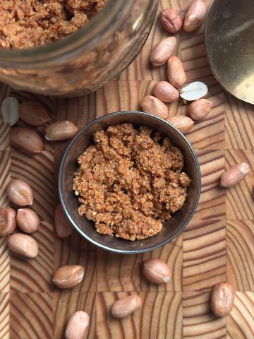 Aromatic Peanut Podi Recipe served in a small ceramic bowl on wooden table
