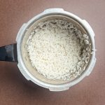 Perfectly cooked white rice in pressure cooker ready to serve