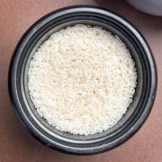 white rice in rice cooker on a table