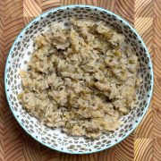 Fluffy cooked high-protein white rice with visible moong dal pieces served in patterned blue bowl