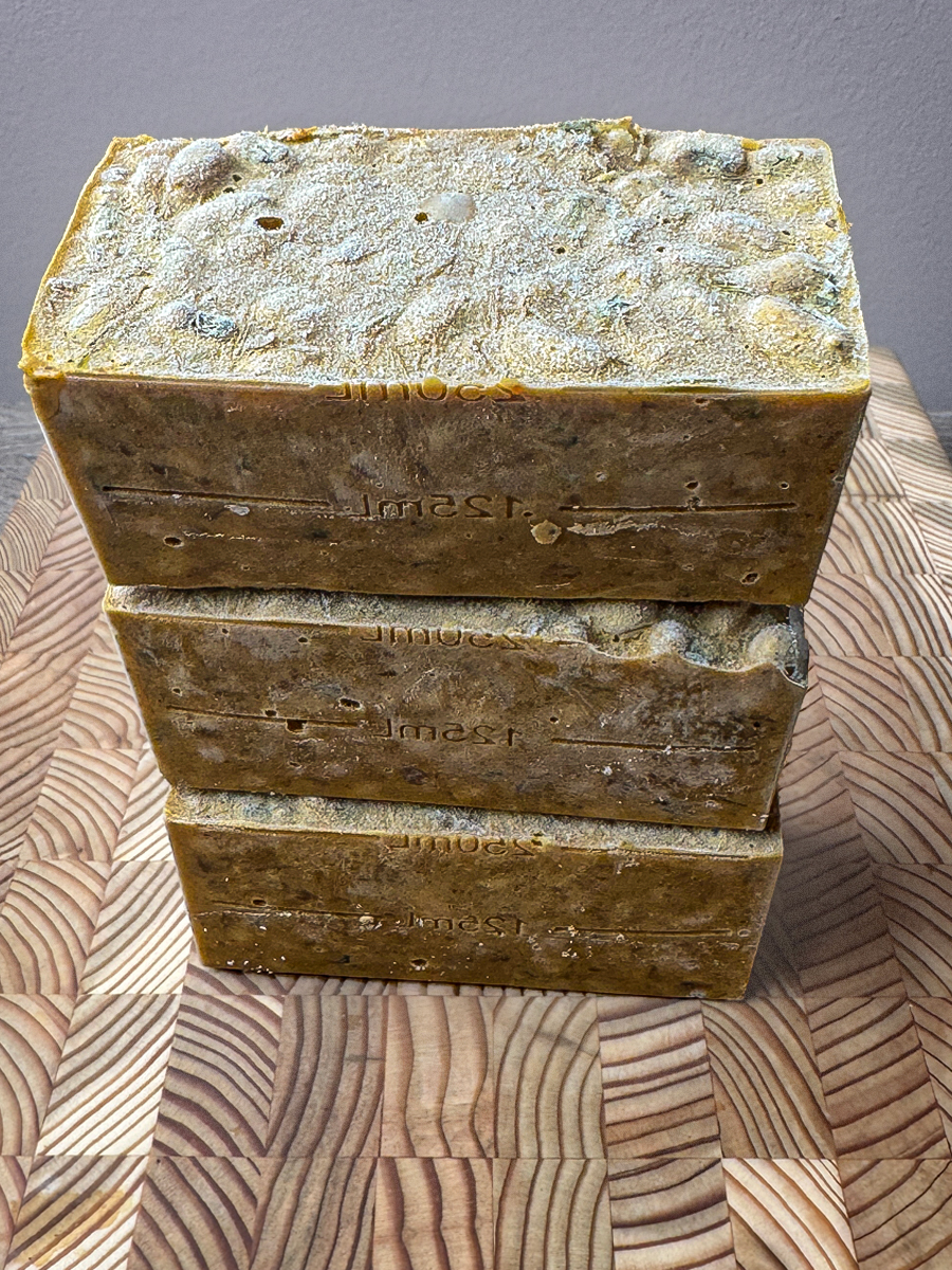 Stacked portions of prepared curry wrapped and ready for long-term freezer meal prep storage