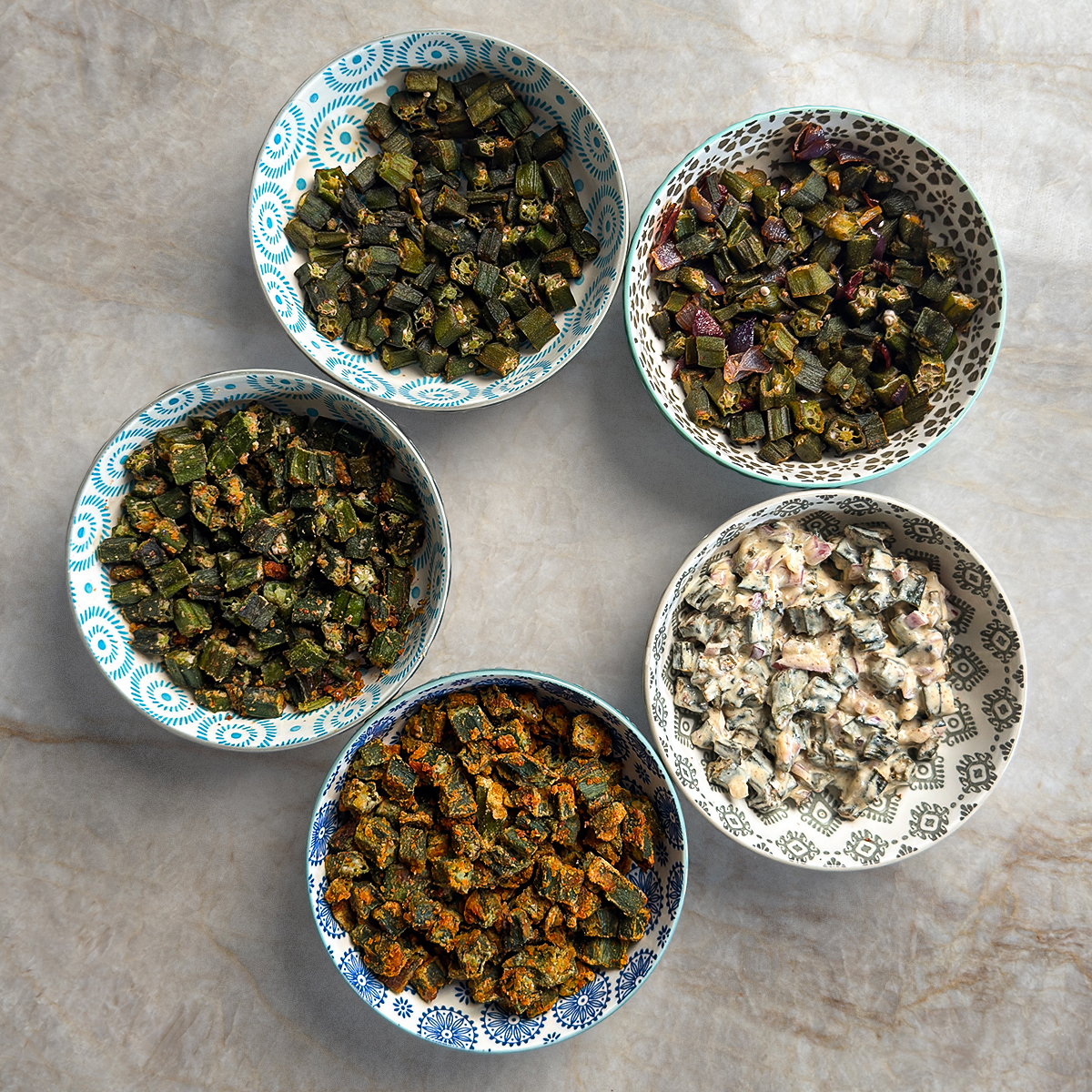 5 Baked Okra Fry Recipes in bowls placed on a table.