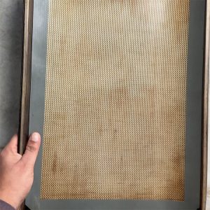 Silicone mat lined on a baking sheet