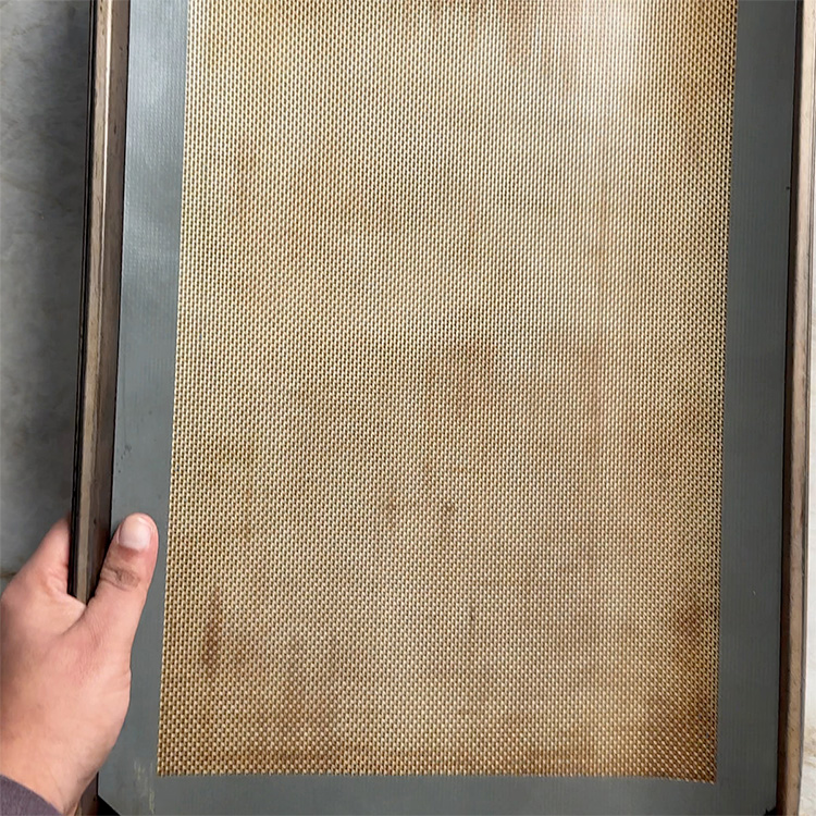 Silicone mat lined on a baking sheet